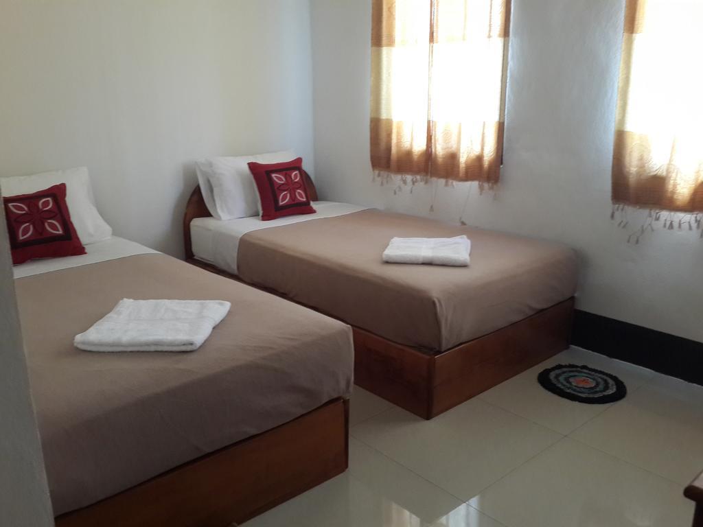 A Tee pensión Luang Prabang Habitación foto
